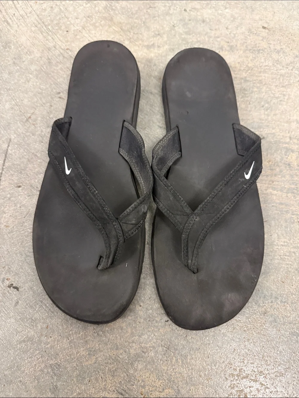 Nike Women’s Black Flip-Flop Sandals with White Swoosh